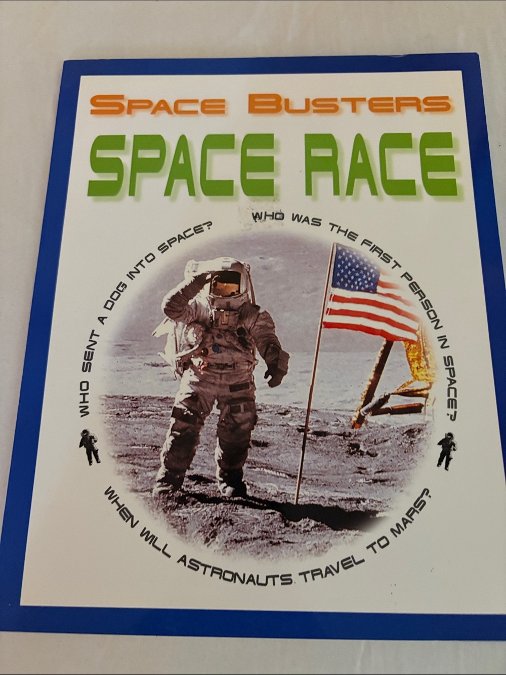 'Space Race' Paperback - Blue, Green, Orange